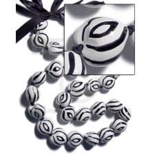 Kukui seeds in animal print