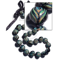 Kukui seeds in animal print