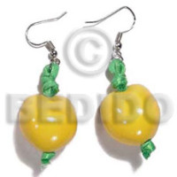 Dangling yellow kukui nuts